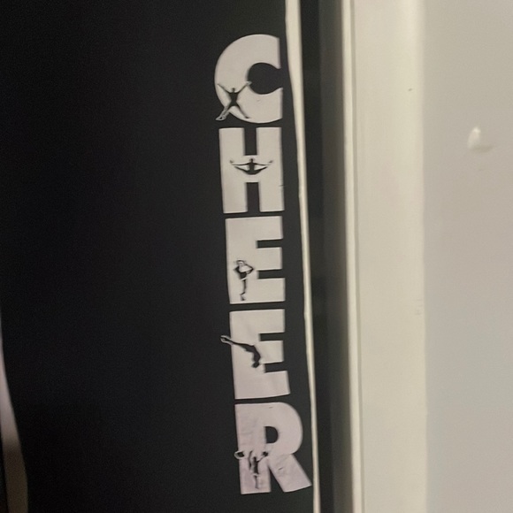 Medium Sized, black sweatpants with “CHEER” down the leg. - Picture 2 of 4